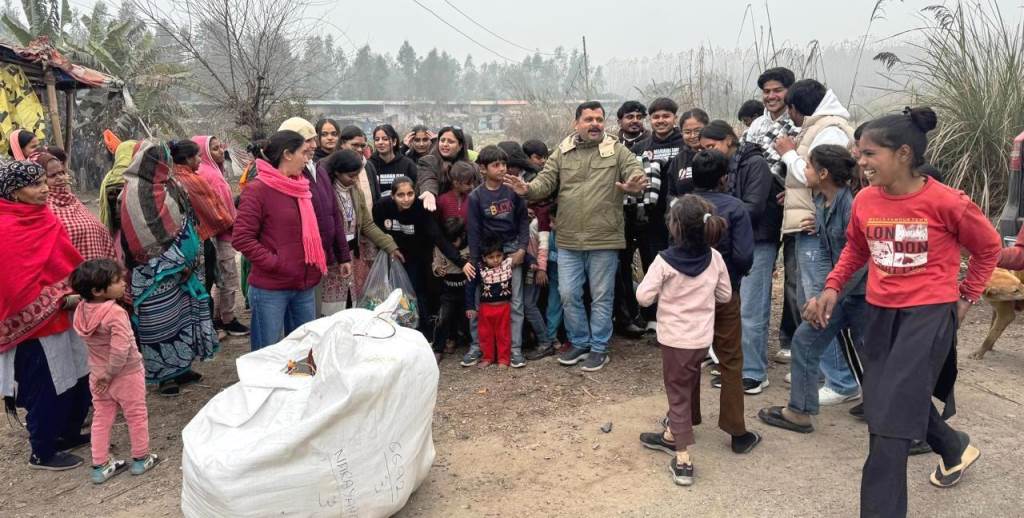 MCA Department of MM University celebrated Makar Sankranti by distributing clothes to the needy
