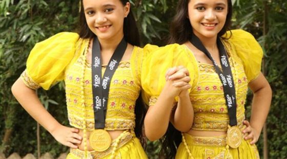 Twin sisters of Sant Ishar Singh Public School have brought pride to the school and the country abroad by winning gold medals in international dance competition.