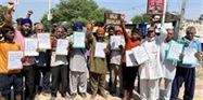Protest against the government for not bringing alcohol, petrol and diesel products under GST.